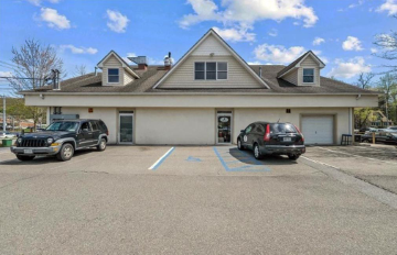 Attractive Rear of building with plenty of parking.